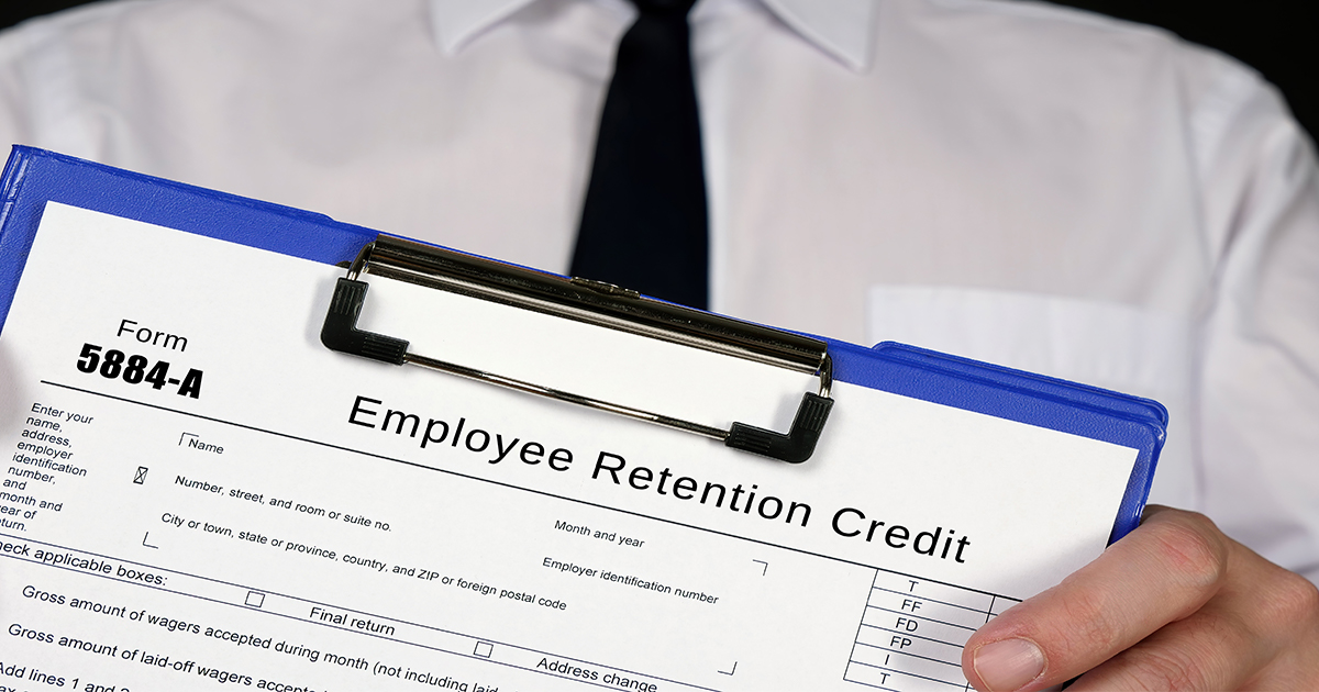 Employer holding Employee Retention Credit form.