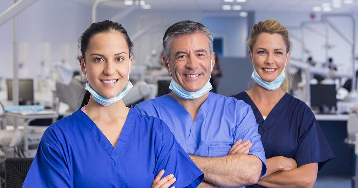 Three members of a dental office